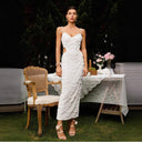 Chic Midi Dress with Unique Cut-Out Design and Artistic Pattern