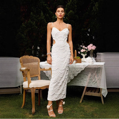 Chic Midi Dress with Unique Cut-Out Design and Artistic Pattern