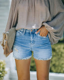 Women's Washed Denim Shorts with Frayed Hem