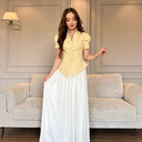 Chic Women's Designer Blouse with Puff Sleeves and Button Accents