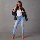 Chic Flared Jeans with Frayed Hems and Trendy Distressed Style