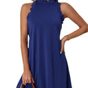 Women's Sleeveless Scalloped Neckline Dress with Flowing Design