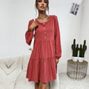 Stylish Women's Dress with Button Accents and Flowy Skirt