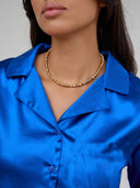 Chic Satin Blouse with Contemporary Collar and Button Closure
