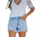 Chic High-Waist Denim Shorts with Trendy Fringes