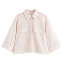 Chic Striped Blouse with Oversized Fit and Pocket Details