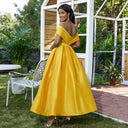 Chic Off-Shoulder Evening Dress with Stylish Hem