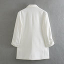 Chic Blazer Jacket with Structured Sleeves and Gold Accents