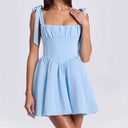 Chic Summer Dress with Cutout Back and Bow Details