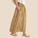 Women's Flowing Maxi Skirt with Elastic Waist and Button Details
