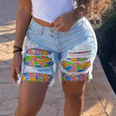 Chic Women's Denim Shorts with Vibrant Prints and Fringe Detail