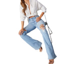 Woman's Frayed Hem Flared Jeans - Faded Style