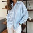 Striped Women's Blouse with Rounded Hem and Button Closure
