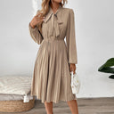 Chic Pleated Dress with Neck Tie & Long Sleeves