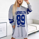 Stylish Women's Oversized V-Neck Sports Dress with Contrasting Sleeves