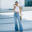 Chic Women's High-Waist Flared Jeans with Distressed Hem