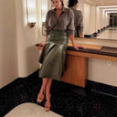 Chic Faux Leather Midi Skirt with Flowing Hem