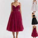 Chic Cocktail Dress with Adjustable Straps and Shimmering Overlay