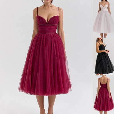 Chic Cocktail Dress with Adjustable Straps and Shimmering Overlay