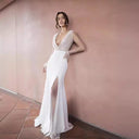 Chic High Slit Evening Gown with Sheer Top and Pearl Accents