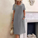 Chic Midi Dress with Pleats and Handy Pockets