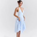 Chic Midi Dress with Deep V-Neck and Flowing Skirt