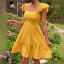 Women’s Cotton Dress with Ruffle Accents and Open Back Design