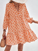 Boho-Style Summer Dress with Flowing Design and Ruffle Accents