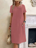 Chic Midi Dress with Pleats and Handy Pockets
