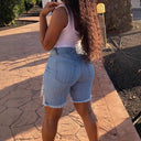 Trendy Women's Distressed Denim Shorts with Frayed Edges