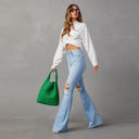 High-Waisted Flared Jeans with Ripped Design