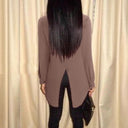 Chic Long Blouse with Modern Cut and Button Detail
