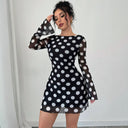 Chic Women's Mini Dress with Unique Back Cutout and Contemporary Dot Design