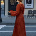 Chic Pleated Maxi Dress with Ruffles and Long Sleeves