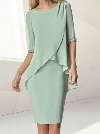 Chic Wrap Dress with Flowing Hem and Lace Details