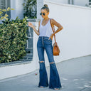 Chic Women's Flared Jeans with Trendy Distressed Design and Button Accents