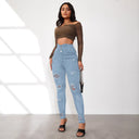 Chic High-Waisted Skinny Jeans with Trendy Rips & Button Placket