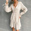 Chic Mini Dress with V-Neck and Puffed Sleeves