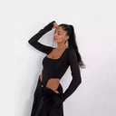 Stylish Women's Bodysuit with Unique Cut-Outs & Long Sleeves