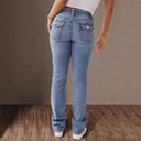 Trendy High-Waisted Slim Jeans with Unique Button Closure