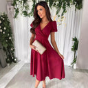 Chic Midi Dress with Wrap Design and Flared Skirt