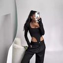 Stylish Women's Bodysuit with Unique Cut-Outs & Long Sleeves