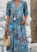 Chic Midi Dress with Pocketed Style