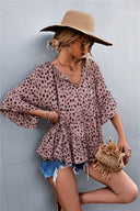 Chic Women's Blouse with Statement Sleeves and Polka Dot Design