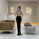 Glamorous Evening Dress with Shimmering Top and Flattering Skirt
