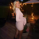 Chic Mini Dress with Statement Sleeves and Ruching Details