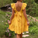 Women’s Cotton Dress with Ruffle Accents and Open Back Design