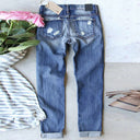 Chic Women's Clover Print Jeans with Trendy Distressed Accents