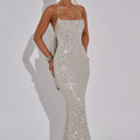 Stunning Evening Gown with Shimmering Sequins and Chic Accents