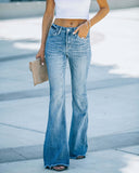 Vintage High-Waisted Flared Jeans with Frayed Hem